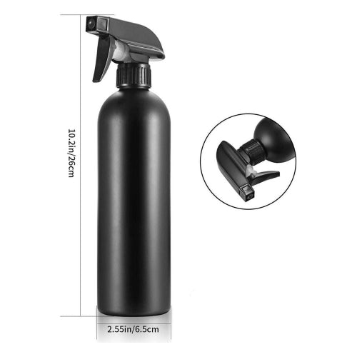 Black spray bottle with nozzle detail on a white background