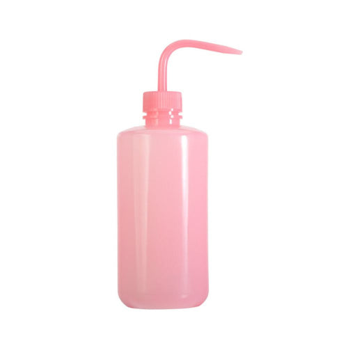Pink squeeze bottle with a long spout on a white background